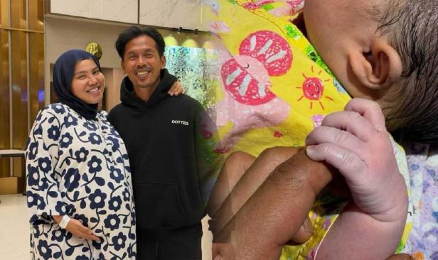 Shuib, Watie timang bayi perempuan